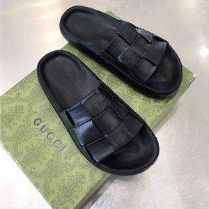 Bottega Veneta black woven leather cloud slides